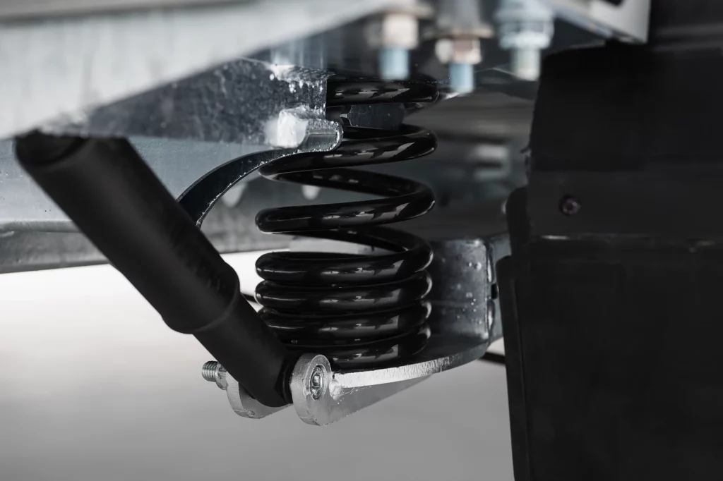 Suspension Pullman 2 : roues indépendantes, ressort et amortisseur hydraulique